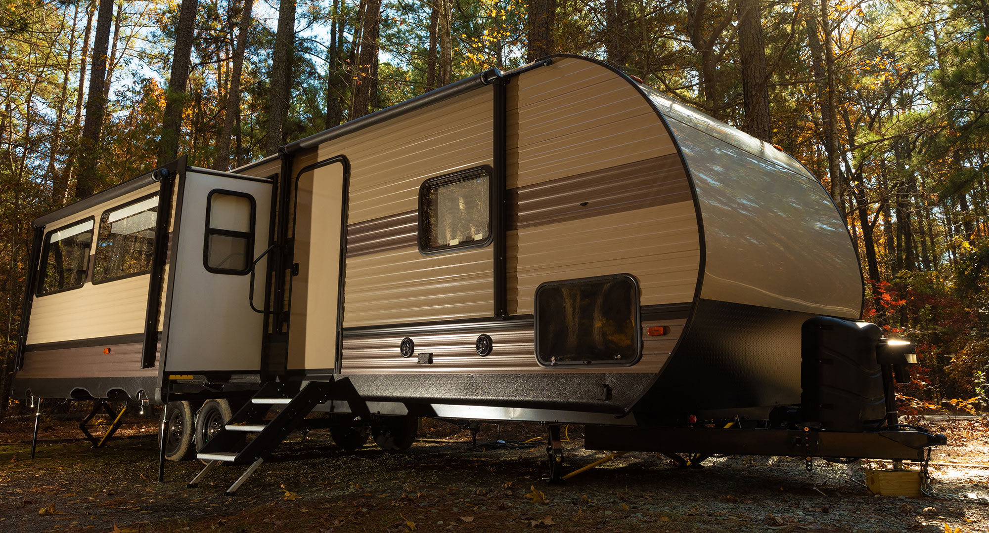 An RV in a forest